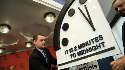 Getty Images The clock veiling unveiled at 11:58pm at 2018 ceremony