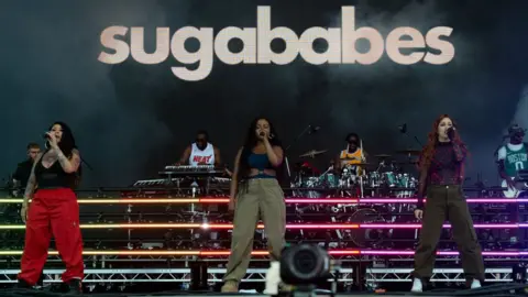 Getty Images Three members of the Sugababes perform at the Isle of Wight festival