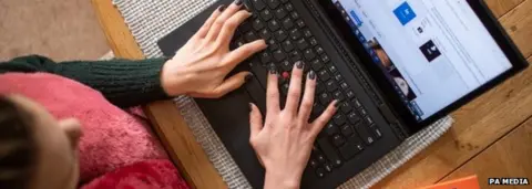 PA Media Women working at home