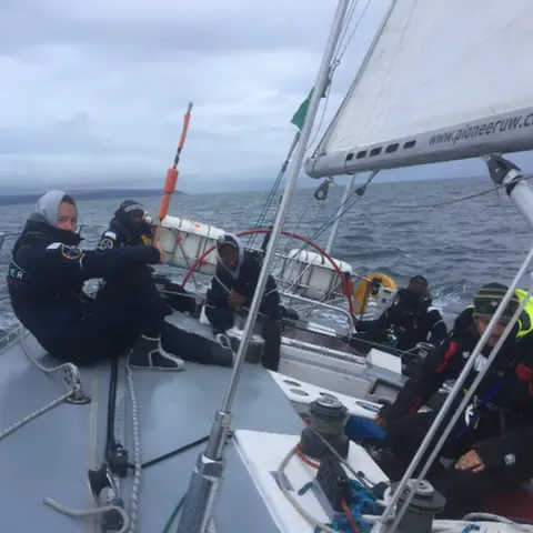 Jon Holt Greig City Academy Crew on deck during Fastnet