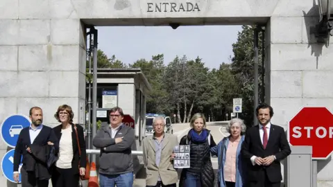 EPA Relatives of the men exhumed at Valley of the Fallen) stand outside the site at San Lorenzo del Escorial in Madrid, Spain on 23 April 2018.