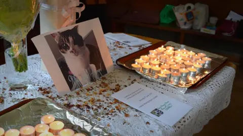 BBC Altar to victims of the cat killer