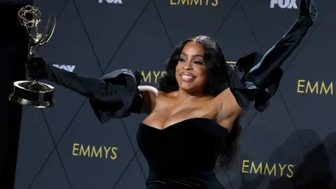 Getty Images Niecy Nash-Betts, winner of the Outstanding Supporting Actress in a Limited or Anthology Series or Movie award for “Dahmer – Monster: The Jeffrey Dahmer Story,” poses in the press room during the 75th Primetime Emmy Awards at Peacock Theater on January 15