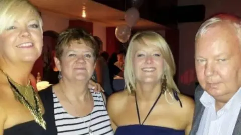 Donna Duffy John Duffy with his wife and daughters