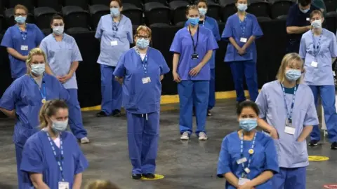 Charles McQuillan Health staff at the SSE Arena in Belfast on Monday