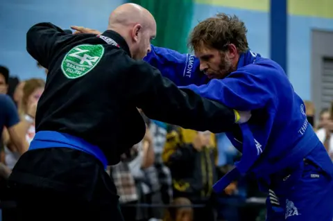 Tom Hardy 'raises the flag for jiu-jitsu' in Milton Keynes