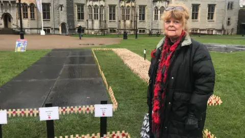 Jayne Morgan Dawn Davies, 73, daughter of Leading Seaman Claude Leslie Arkell, attending the Field of Remembrance at Cardiff Castle