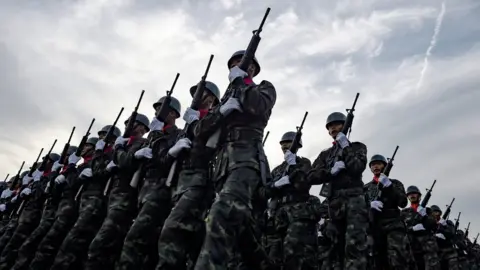 AFP Thai soldiers marching in a parade