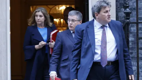 EPA Cabinet ministers leave a meeting in Downing Street