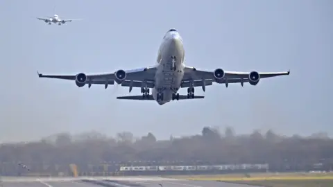 REUTERS/Toby Melville An aeroplane taking off at Gatwick Airport