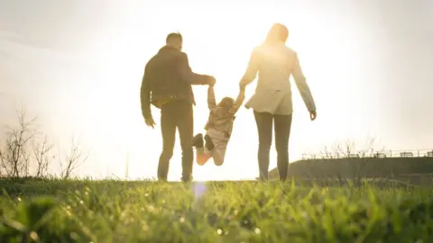 Getty Images parents with single child