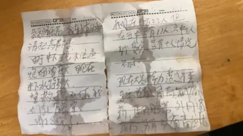 Xinhua Note sent by trapped Chinese miners