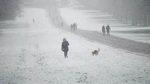 PA Media Early morning snow on the Long Walk at Windsor Castle, Berkshire,