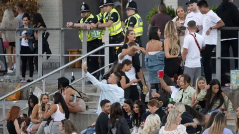 Matthew Horwood People congregating at Cardiff Bay