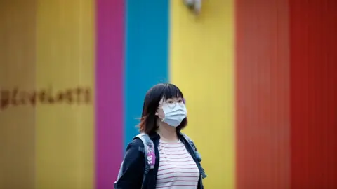 EPA Woman in mask in Taipei