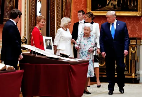 Reuters Queen Elizabeth shows Mr Trump items on display