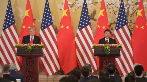 Getty Images US President Donald Trump (L) and China's President Xi Jinping speak during a joint statement in Beijing on November 9, 2017.