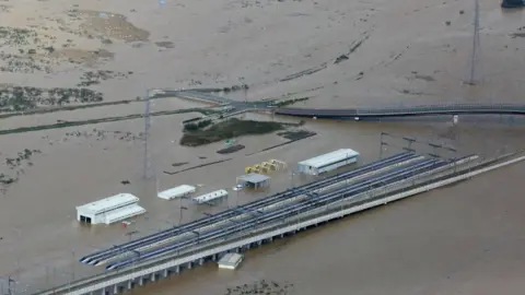 AFP The Hokuriku-Shinkansen line trains were parked in a yard in Nagano city