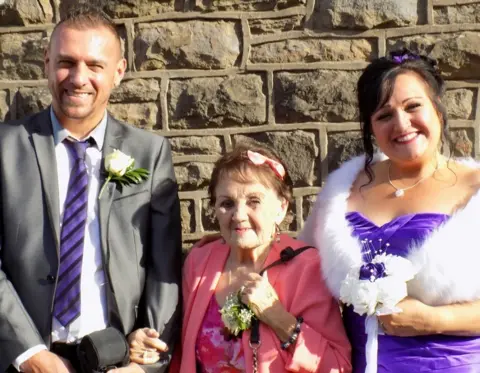 family photo Claire, her fiancée David and her mother Maureen