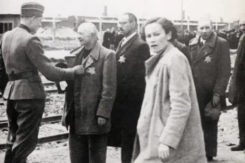 Getty Images German inspection of Jews arriving at Auschwitz, 1944