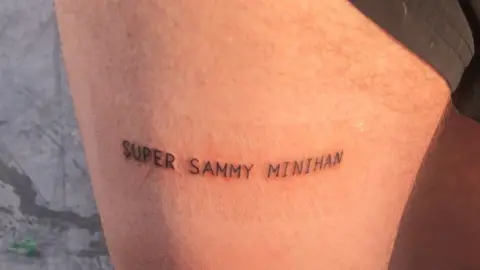 Callum Taylor Tattoo of Super Sammy Minihan on man's leg