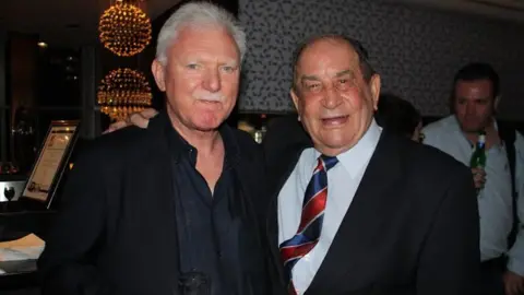 Wigan Observer Dave Bolton (right) with Wigan chairman Ian Lenagan in Sydney in 2014