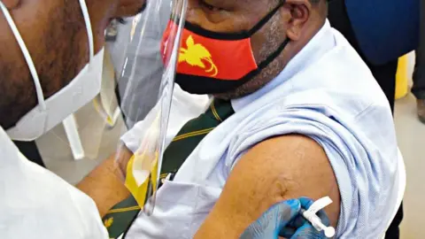 AFP Papua New Guinea's Prime Minister James Marape is vaccinated