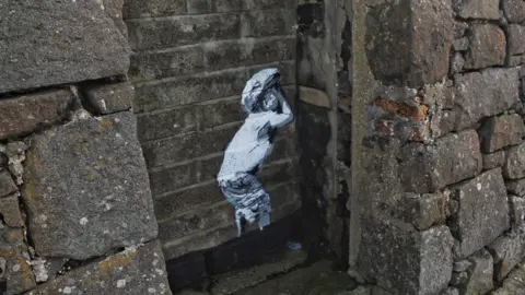 BBC Banksy-style street art in Portstewart