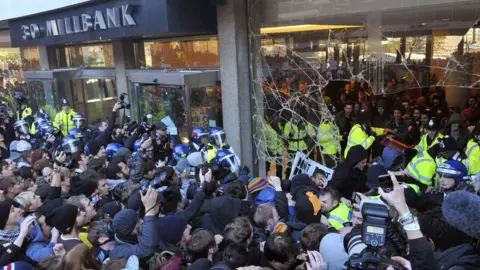 Reuters Police and demonstrators confront each at Millbank