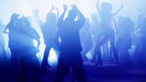 Getty Images Dancers in a nightclub