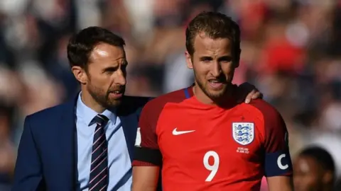 Getty Images Kane and England manager Gareth Southgate after 2-2 draw with Scotland