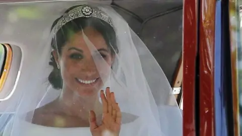 Rex/Shutterstock Meghan Markle arriving at her royal wedding ceremony