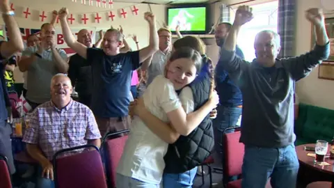 Image of girls hugging after the final whistle of the Euro 2022 final