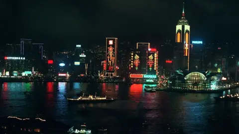 Getty Images Departure of HMY Britannia from Victoria Harbour, Hong Kong in 1997