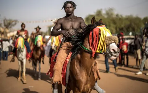 AFP A horseman prepares to parade for the opening ceremony of the Panafrican Film and Television Festival in Ouagadougou, on February 23, 2019