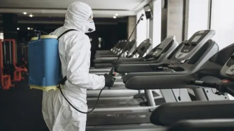 PSS PSS worker decontaminating gym