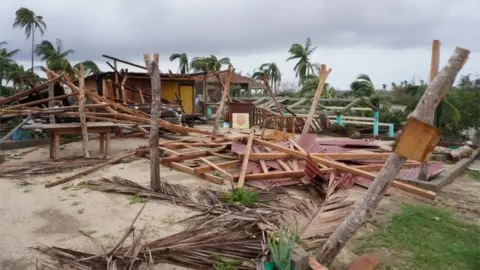 Reuters A restaurant is damaged in the aftermath of Hurricane Agatha, in San Isidro del Palmar, Oaxaca state, Mexico, May 31, 2022