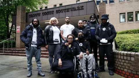 Jordan Pettitt Jordan Walker-Brown with family and friends outside Southwark Crown Court, south London, after the verdict