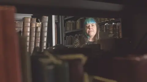 Sarah in the special collection library