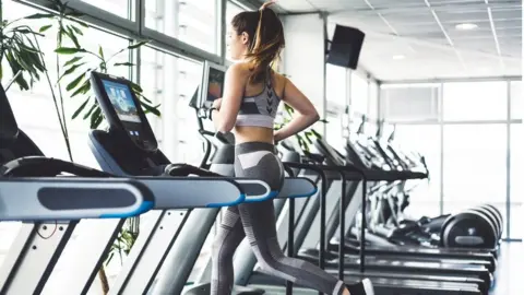 Getty Images Woman on treadmill
