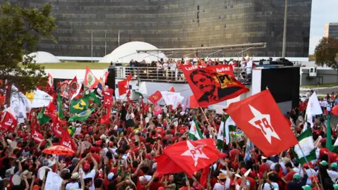 AFP/Getty Lula's supporters massed outside the Electoral Supreme Court in Brasilia August 2018