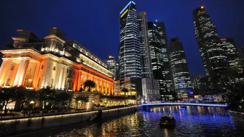 Getty Images Night view Singapore skyline