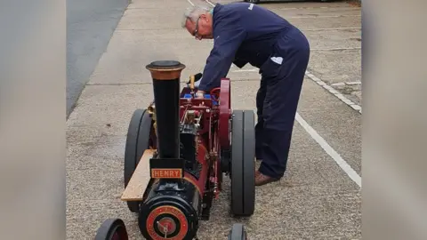 Helen Smith Michael Oakman with his steam traction engine