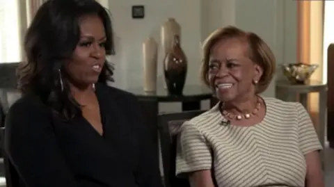 Michelle Obama and Marian Robinson sat next to each other