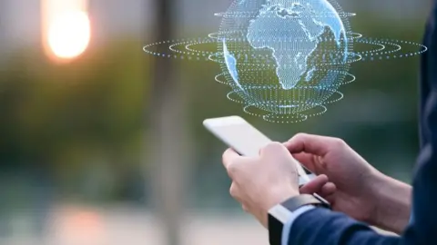 Getty Images Phone with graphic of world