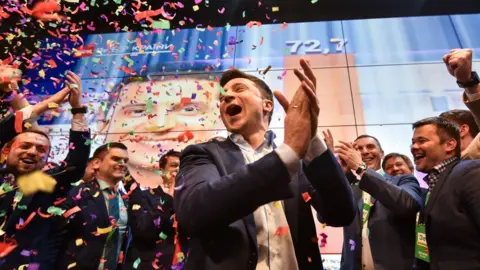 AFP Ukrainian presidential candidate Volodymyr Zelensky reacts after winning the presidential election in April