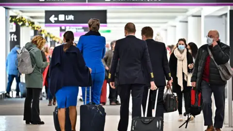 Getty Images Passengers at Edinburgh Airport