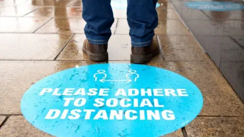 Getty Images social distancing sign in Edinburgh