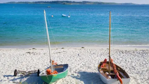 Getty Images Boats on Isles of Scilly beach