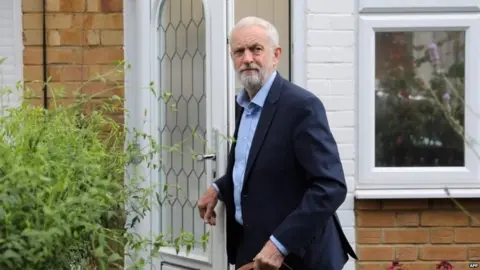 AFP Jeremy Corbyn leaving his home